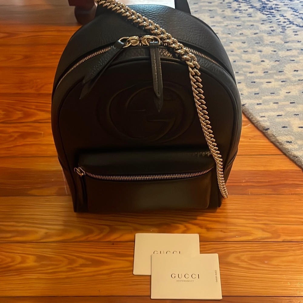 Soho chain back pack. Black leather, gold chain. Perfect condition